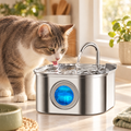 Cat drinking from a window pet water fountain on a kitchen counter